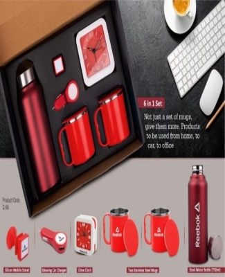 6 in 1 set: Steel Water bottle (750ml), Silicon mobile stand, Glowing Car charger, Glow Clock, Two Stainless steel mugs